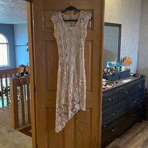 Beautiful fully lined crochet asymmetrical hem dress